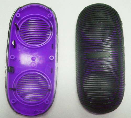 Overmolding adds a secondary material (often a soft elastomer or rubber) over a substrate (plastic or metal) to create a multi-layered part.