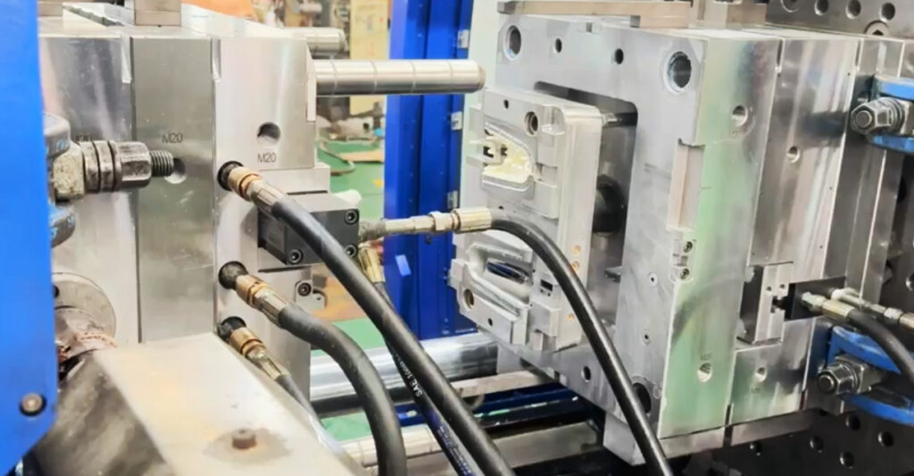 in-house rotary axis two-shot injection molding machine 470T with core-back